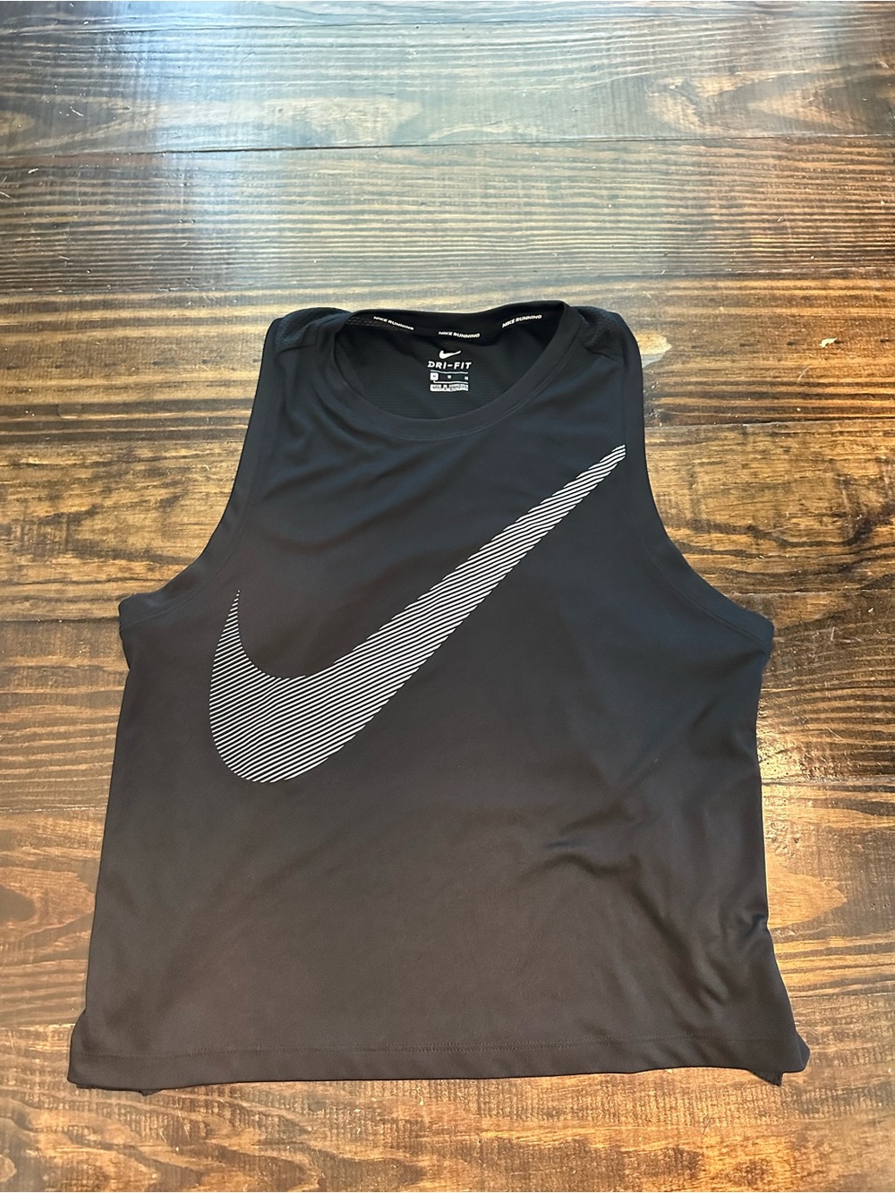 Nike Black Tank Top with Striped Silver Swoosh women’s size medium